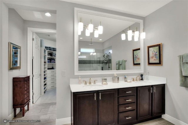 bathroom with an enclosed shower and vanity