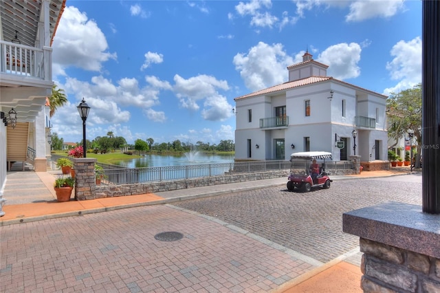 view of patio with a water view