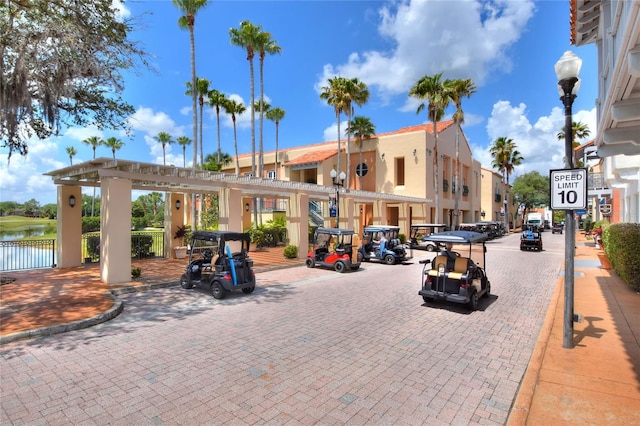 surrounding community featuring a water view