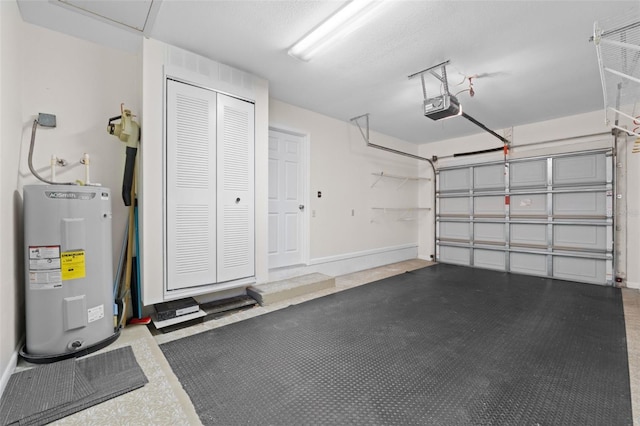 garage featuring electric water heater and a garage door opener