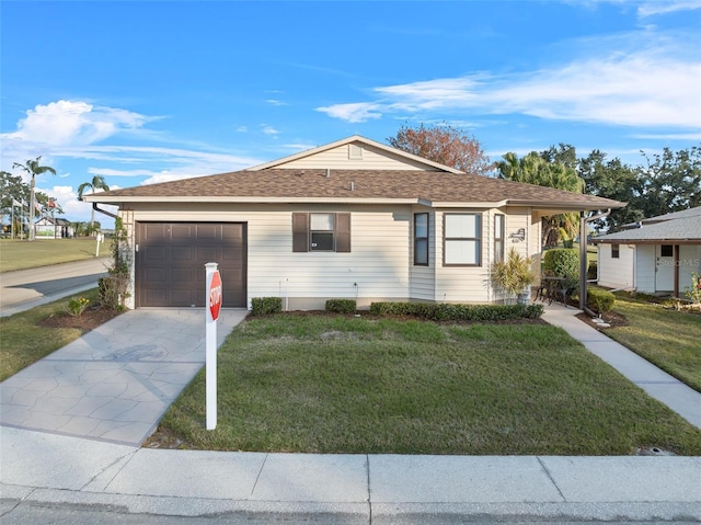 single story home featuring a garage and a front lawn