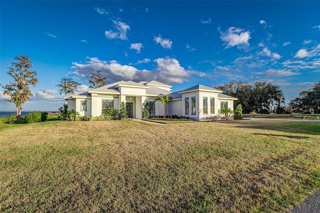 view of front of property with a front lawn