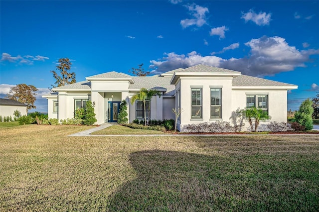 view of front facade with a front yard