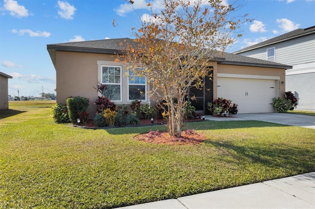 view of front facade featuring a garage and a front yard