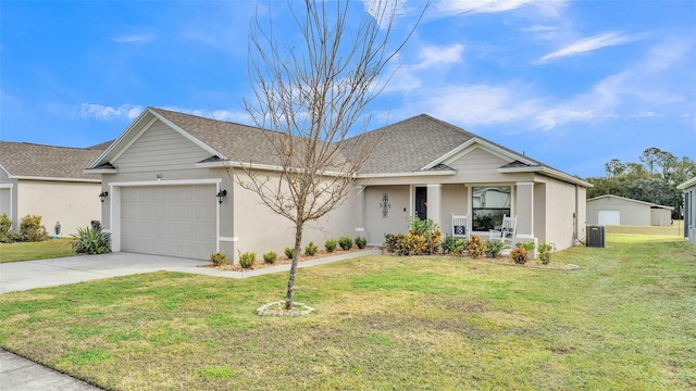 view of front of home with a front lawn, cooling unit, covered porch, and a garage