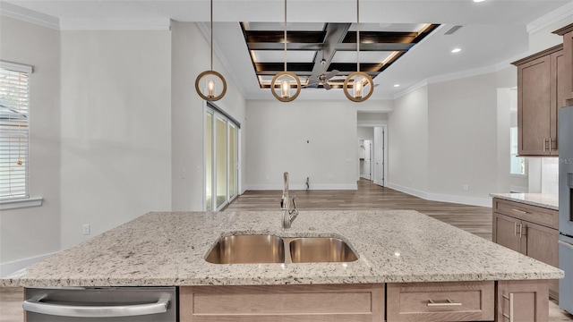 kitchen with coffered ceiling, sink, light stone counters, stainless steel dishwasher, and pendant lighting