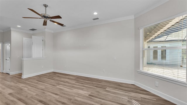 unfurnished room featuring crown molding, ceiling fan, and light hardwood / wood-style flooring