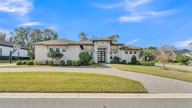 view of front of home with a front lawn