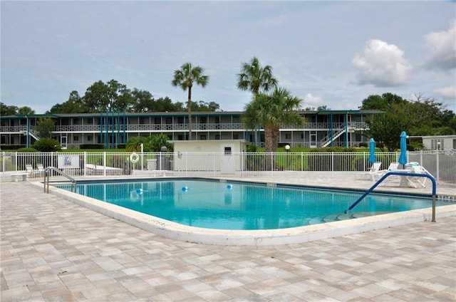 view of pool featuring a patio area