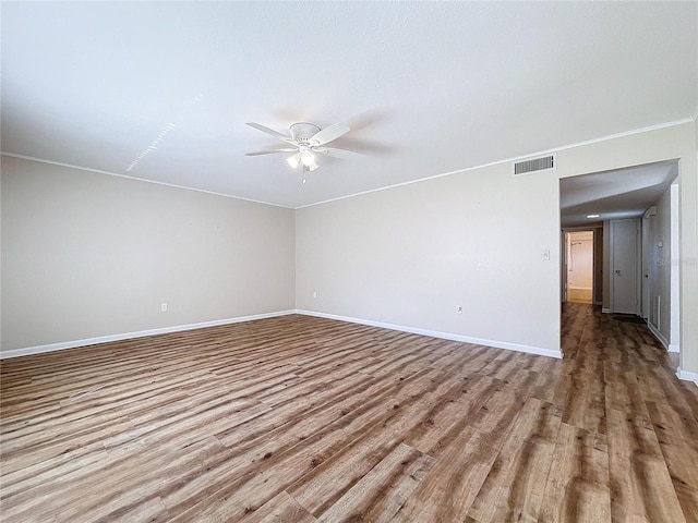 unfurnished room with ceiling fan and light hardwood / wood-style floors