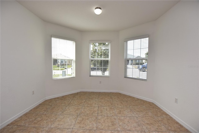 view of tiled spare room