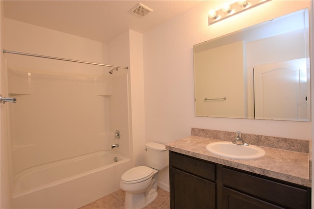 full bathroom with washtub / shower combination, toilet, vanity, and tile patterned flooring