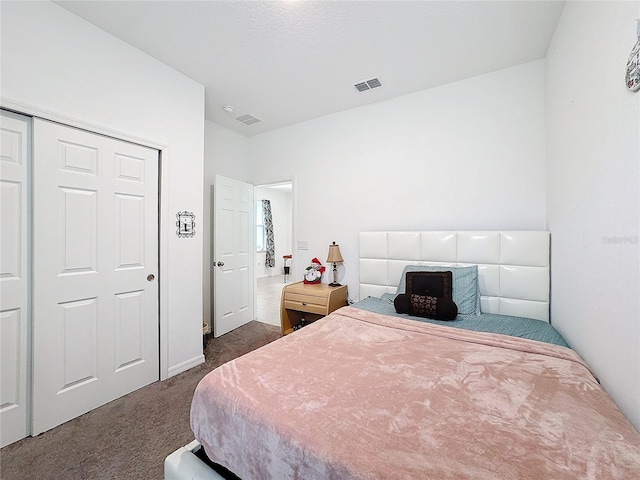 carpeted bedroom featuring a closet