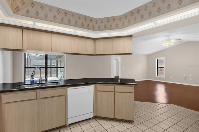 kitchen with dishwasher, light brown cabinets, sink, kitchen peninsula, and ceiling fan