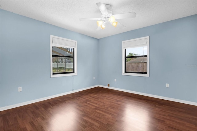 unfurnished room with hardwood / wood-style flooring, a textured ceiling, and ceiling fan