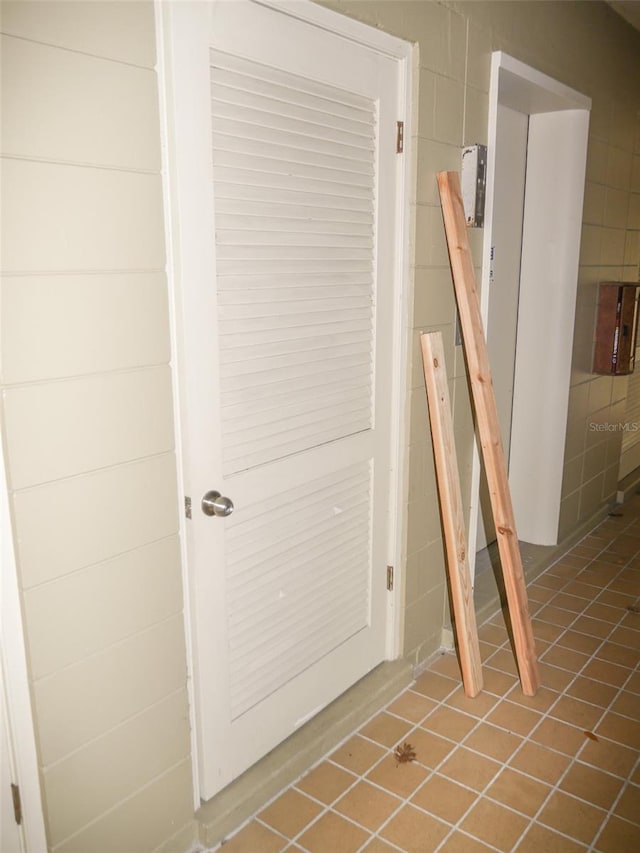 interior space with tile patterned floors