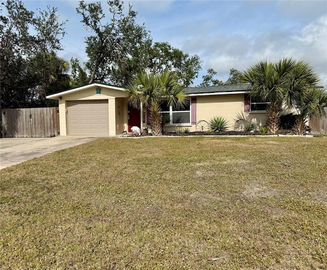 ranch-style house with a front lawn and a garage