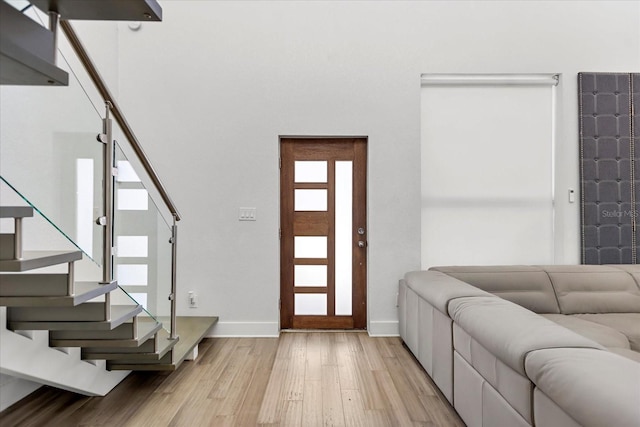 foyer with light wood-type flooring