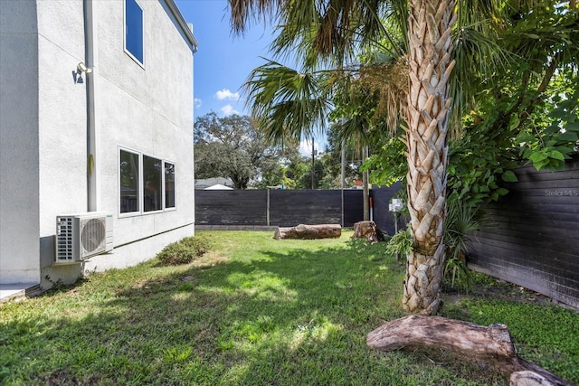 view of yard featuring ac unit