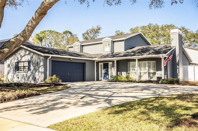 view of front of property with a garage