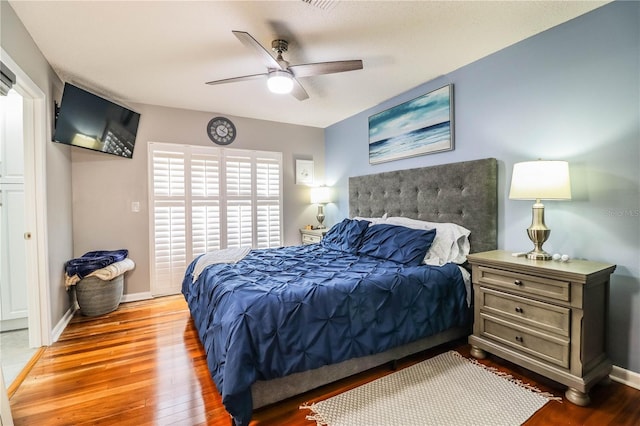 bedroom featuring ceiling fan and light hardwood / wood-style flooring