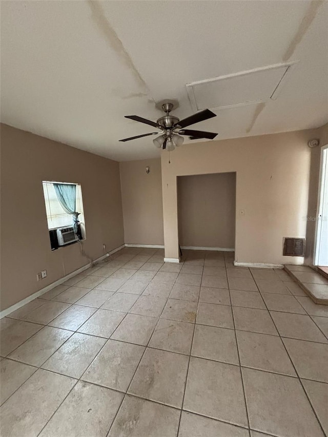 unfurnished room with ceiling fan, cooling unit, and light tile patterned flooring