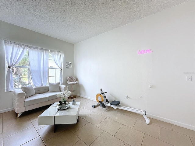 tiled living room with a textured ceiling