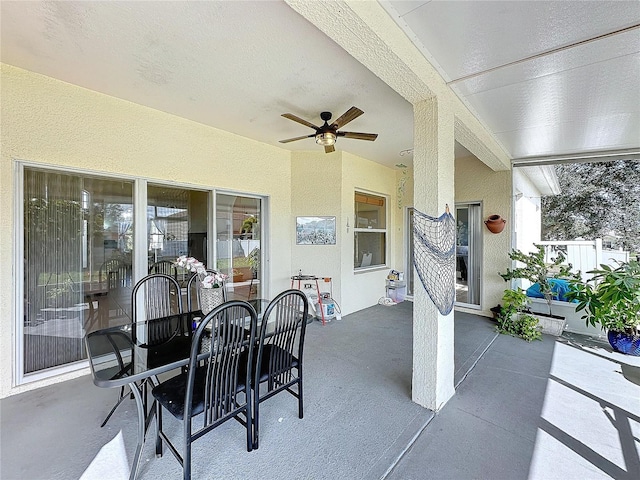 view of patio featuring ceiling fan