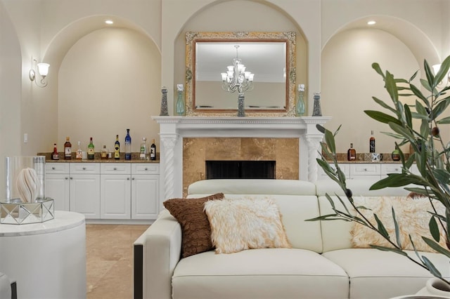 1665 Blue Heron Ln, Lakeland, FL 33813 - living area featuring a chandelier and a premium fireplace