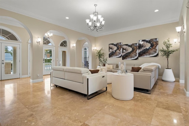 1665 Blue Heron Ln, Lakeland, FL 33813 - living area with arched walkways, a chandelier, crown molding, recessed lighting, and baseboards