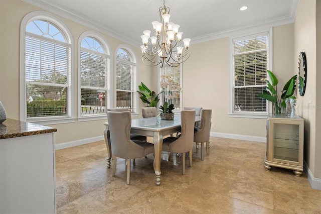1665 Blue Heron Ln, Lakeland, FL 33813 - dining space featuring a chandelier, ornamental molding, plenty of natural light, and baseboards