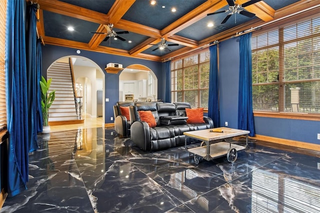 1665 Blue Heron Ln, Lakeland, FL 33813 - cinema featuring marble tiled flooring, a ceiling fan, coffered ceiling, arched walkways, and baseboards