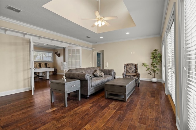 1665 Blue Heron Ln, Lakeland, FL 33813 - living area with dark wood-type flooring, ceiling fan, crown molding, baseboards, and recessed lighting