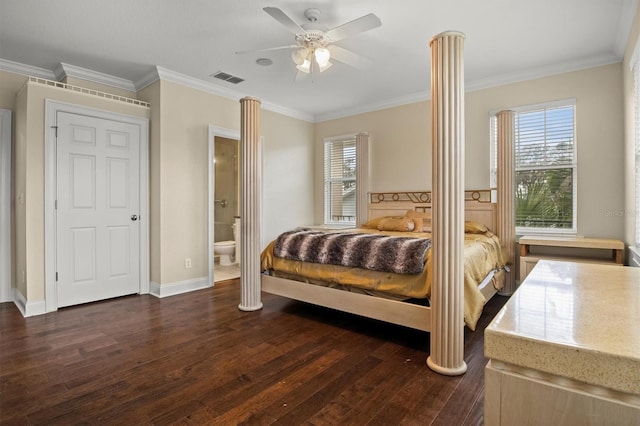 1665 Blue Heron Ln, Lakeland, FL 33813 - bedroom with dark wood finished floors, multiple windows, ornamental molding, ceiling fan, and ornate columns