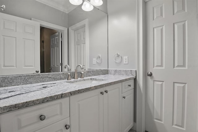 1665 Blue Heron Ln, Lakeland, FL 33813 - bathroom featuring crown molding and vanity