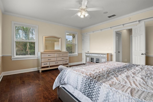 1665 Blue Heron Ln, Lakeland, FL 33813 - bedroom featuring baseboards, ornamental molding, hardwood / wood-style floors, and a ceiling fan