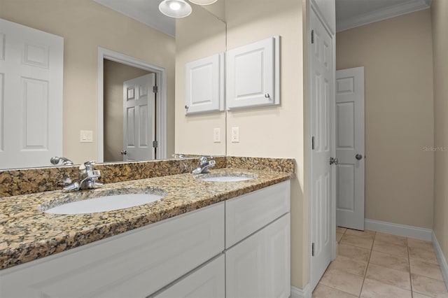 1665 Blue Heron Ln, Lakeland, FL 33813 - full bathroom with baseboards, crown molding, double vanity, and tile patterned floors