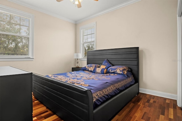 1665 Blue Heron Ln, Lakeland, FL 33813 - bedroom featuring wood finished floors, baseboards, crown molding, and a ceiling fan
