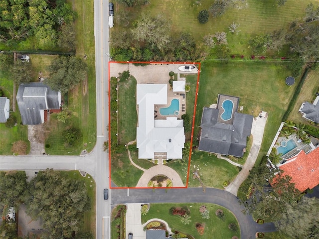 1665 Blue Heron Ln, Lakeland, FL 33813 - aerial view of property's location featuring property boundaries highlighted and a pool area