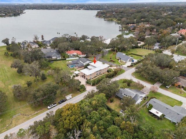 1665 Blue Heron Ln, Lakeland, FL 33813 - aerial overview of property's location with a large body of water and nearby suburban area