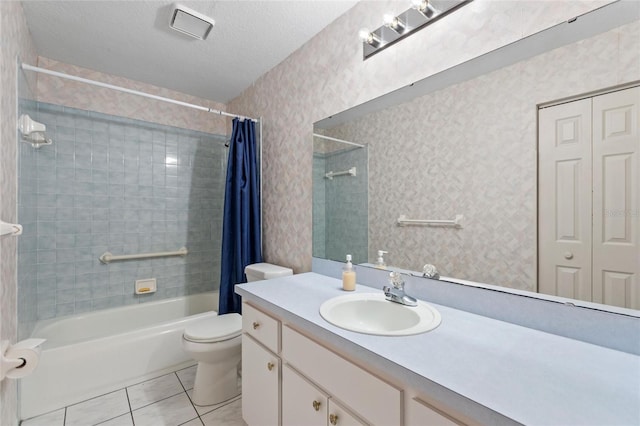 full bathroom with toilet, vanity, tile patterned floors, shower / bathtub combination with curtain, and a textured ceiling