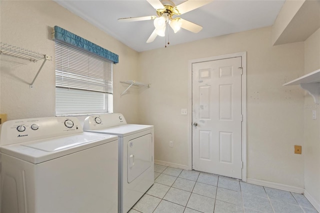 clothes washing area with washer and dryer, ceiling fan, and light tile patterned flooring