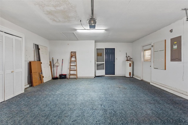 garage featuring electric water heater, a garage door opener, and electric panel