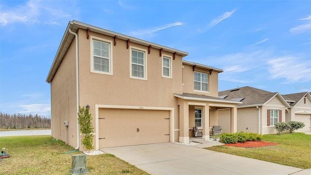 view of front of property featuring a water view, a garage, covered porch, and a front yard