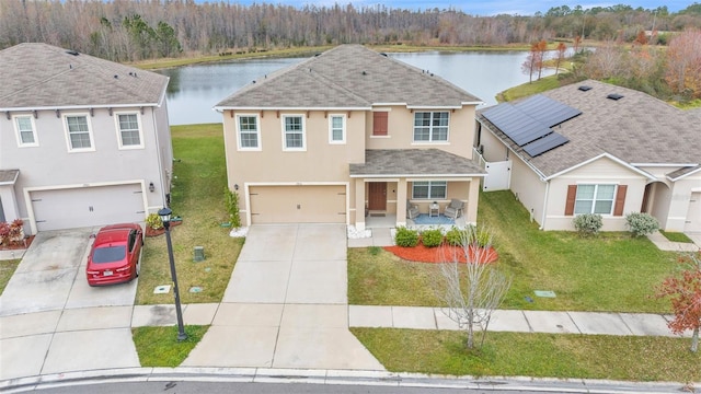 view of front of property featuring a porch, a water view, and a front yard