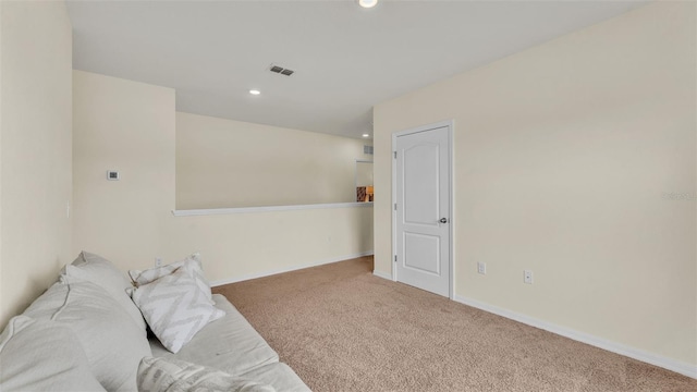 living area featuring carpet flooring