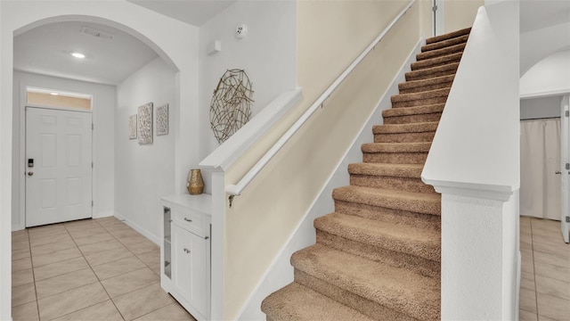 foyer with light tile patterned floors