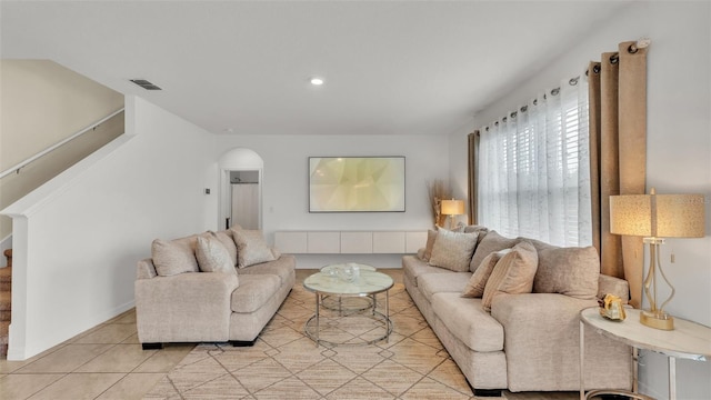 living room featuring light tile patterned flooring