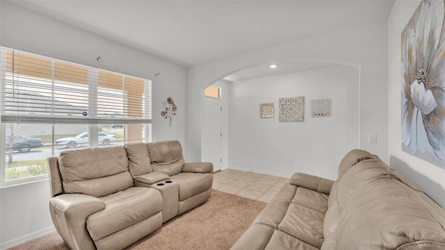 living room with light tile patterned floors