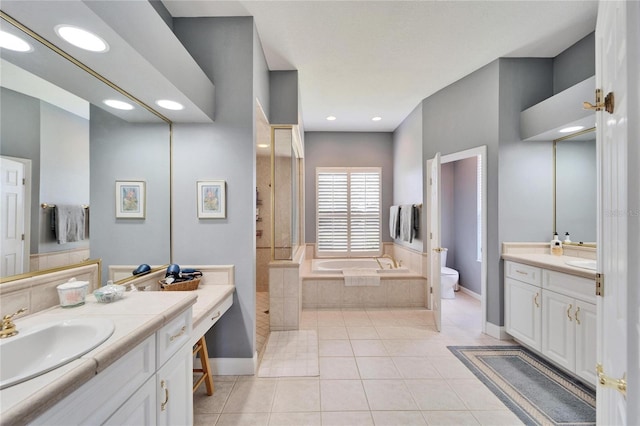 full bathroom featuring independent shower and bath, toilet, tile patterned flooring, and vanity